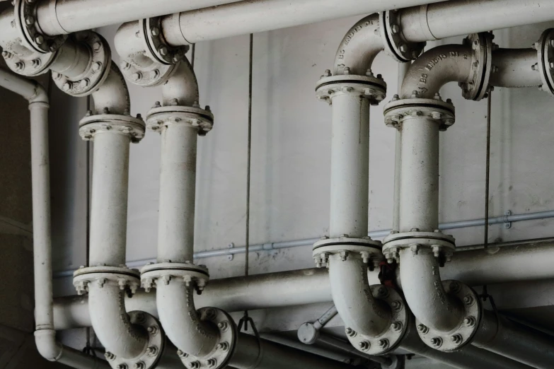the pipes are all connected together on the wall