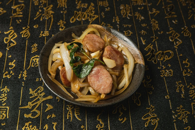 a small bowl of chinese food on a place mat