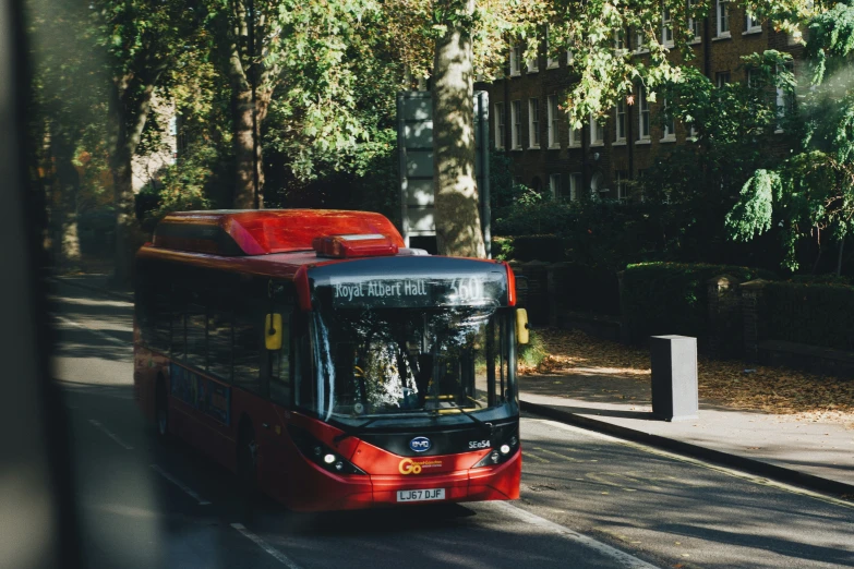 the bus is stopped on the side of the road