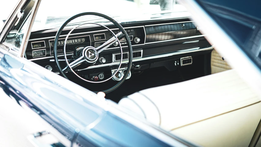 interior of old fashioned car with dashboard and instrument