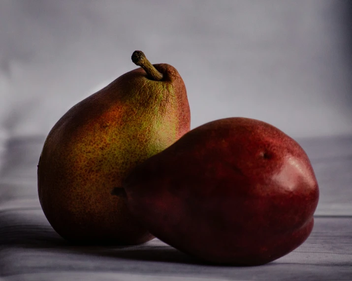 two pieces of fruit on top of each other