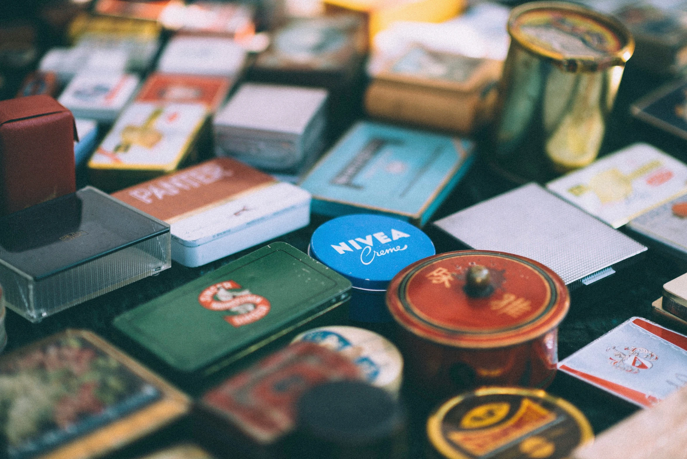 an assortment of match boxes are on the table