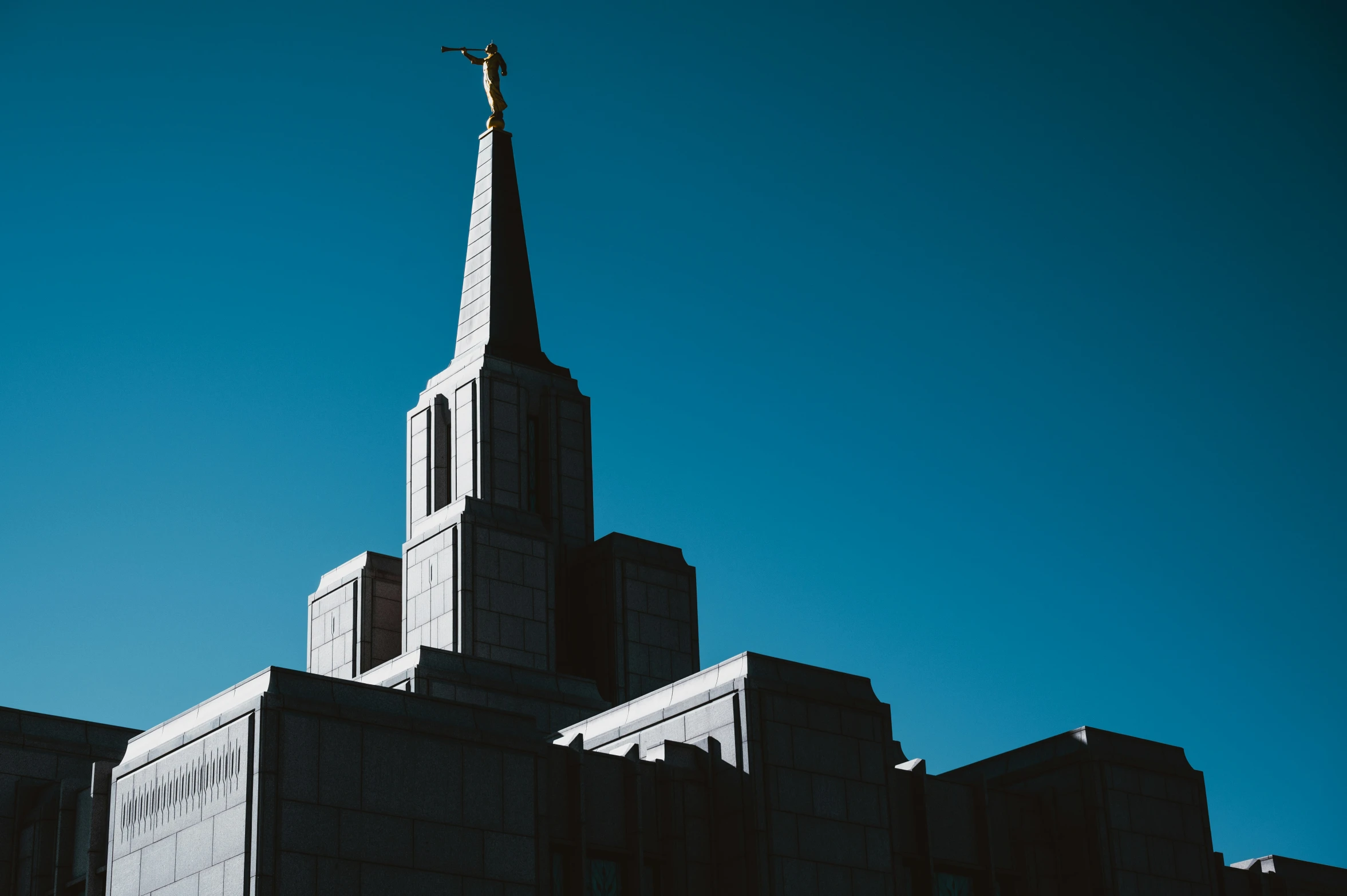 a large cathedral with a cross at the top