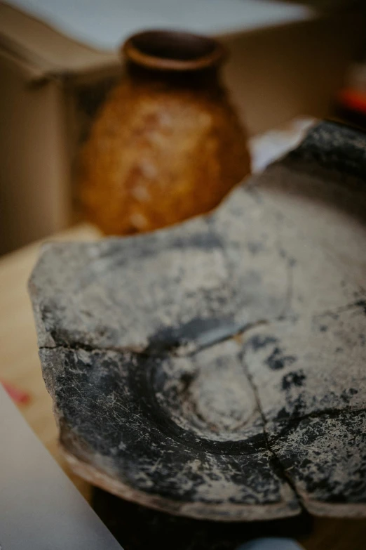 an old object is laying on the table