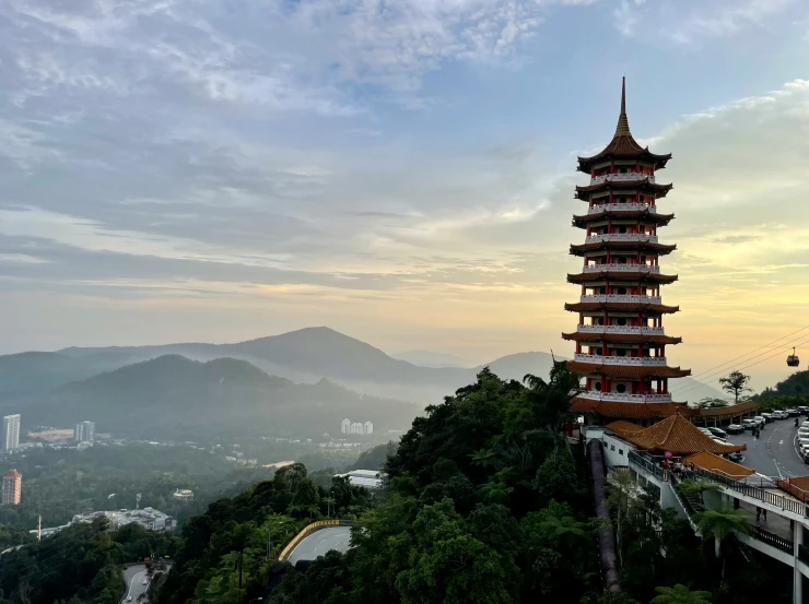 the pagoda tower is on top of the hill