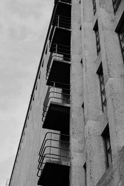 the corner of an apartment building with balconies