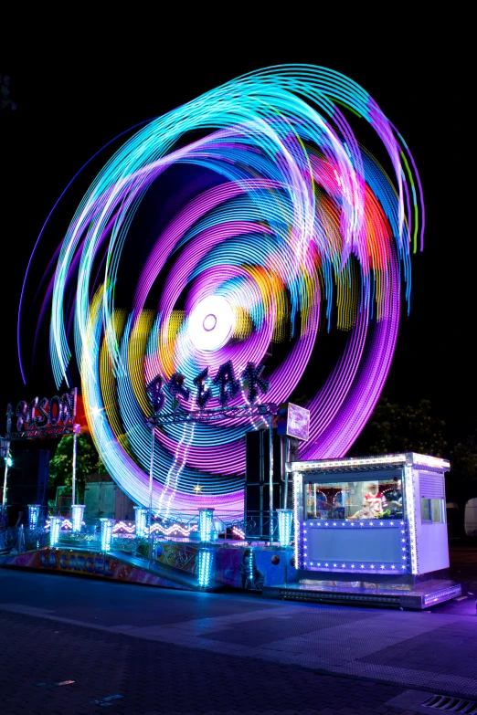 a night time po of the ferris wheel at amut