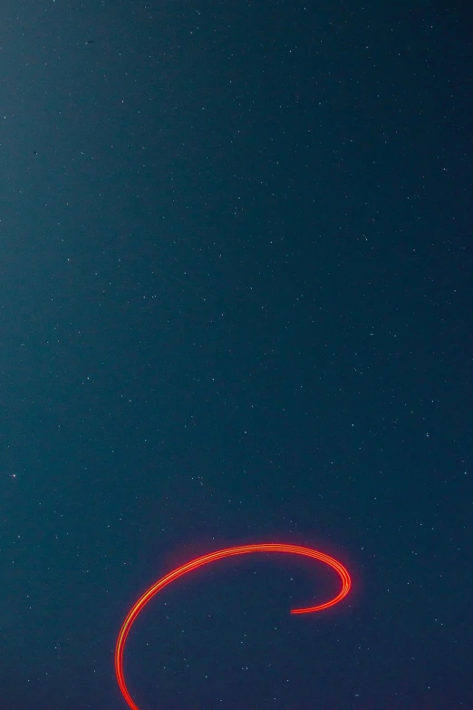 an object being pographed with bright red lights