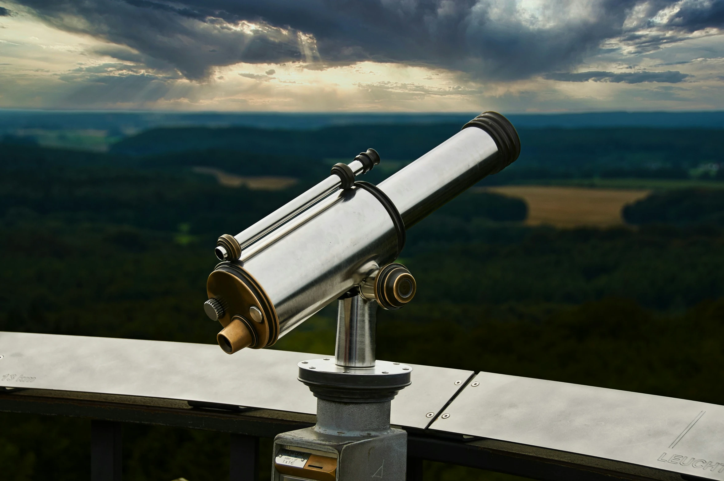 a telescope with the sun shining behind it