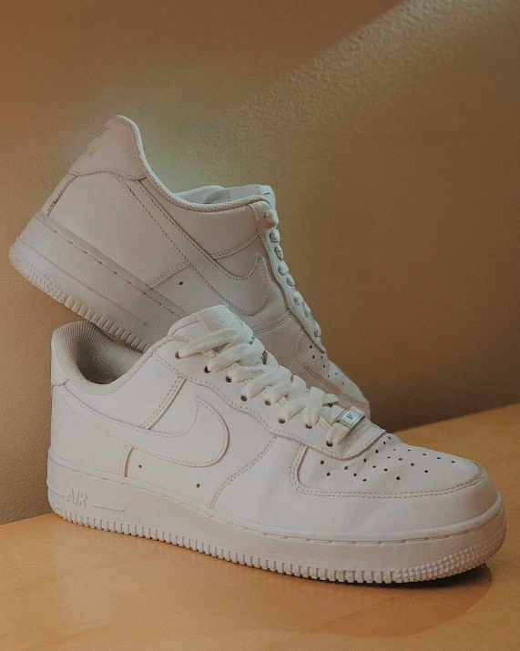 this is an image of a white pair of sneakers