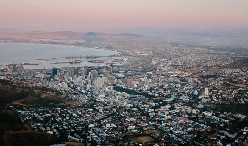 a town sits in the middle of a large body of water