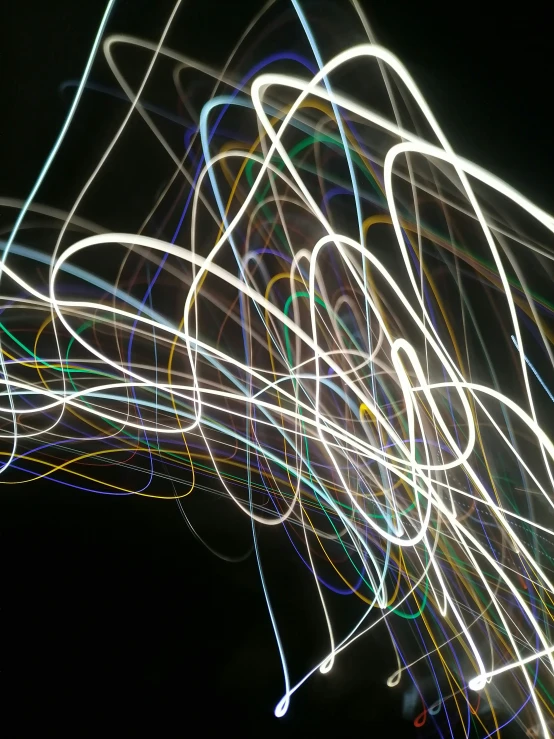 there are very many colorful streaks made by long exposure flash pography