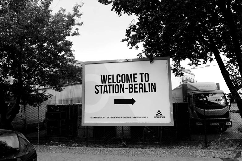 a black and white po of a sign for the city of berlin