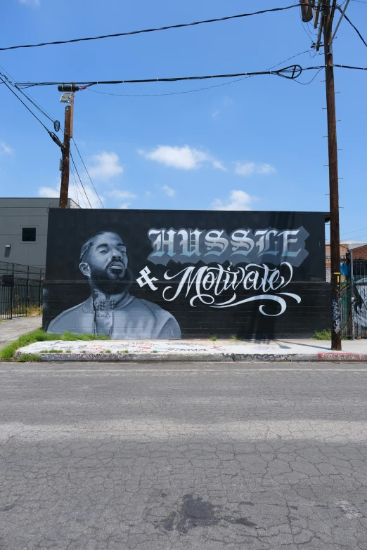 a large mural of an african man on the side of a building