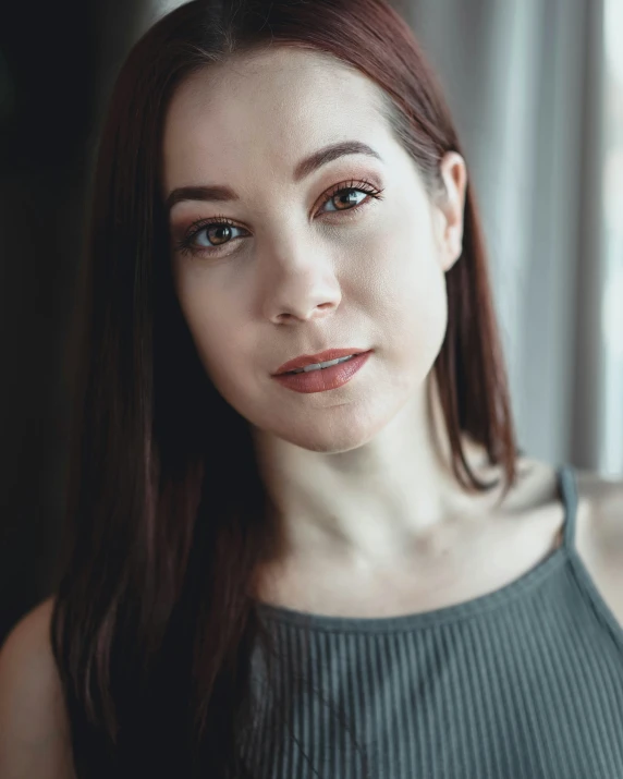 a woman poses for a po in the dark