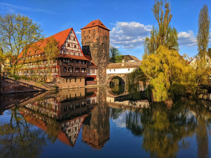 there is a brick building that has a tower and a clock on it