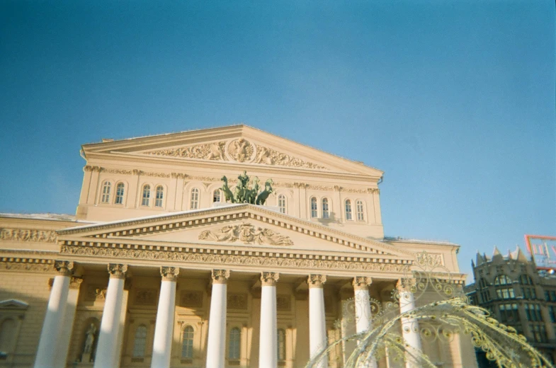 an old courthouse in front of some ornate architecture