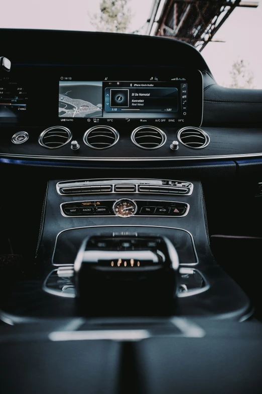 the interior of a car with two different stereo systems