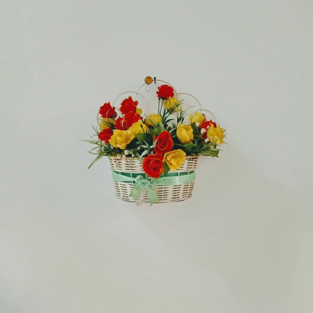 a basket that has some flowers in it