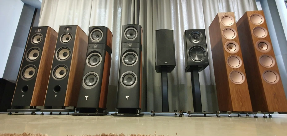 the speakers are lined up in a row