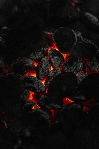 a close up view of fire and rocks