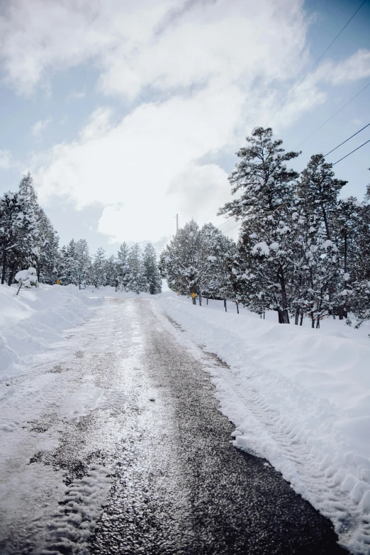 road covered in snow during a snowy day