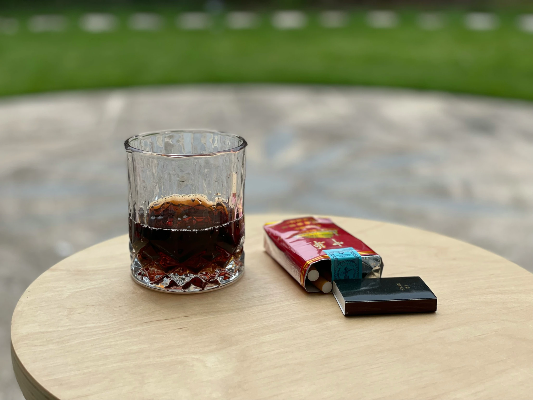 a book and a glass on a table