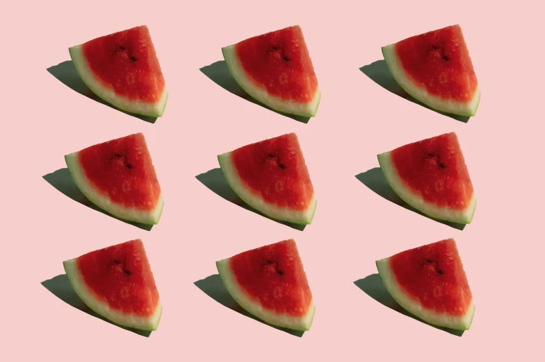 eight slices of watermelon are arranged in a formation