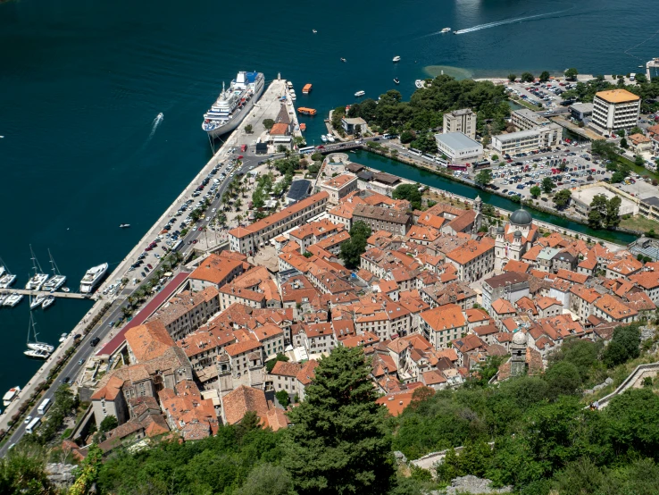 an aerial view of a harbor in a small village