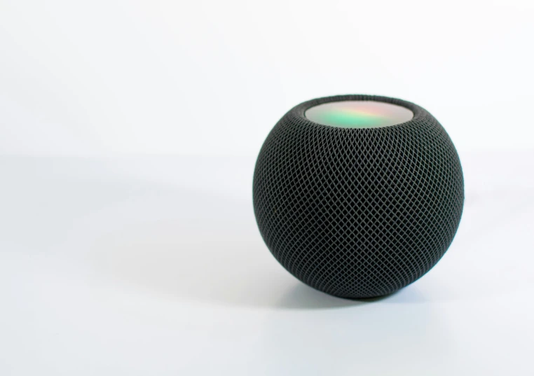 a close up view of a speaker on a white surface