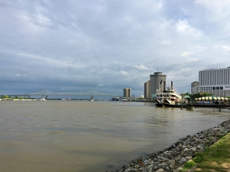 the water near many buildings and a bridge