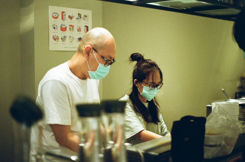 a doctor is tending to a patient at the hospital