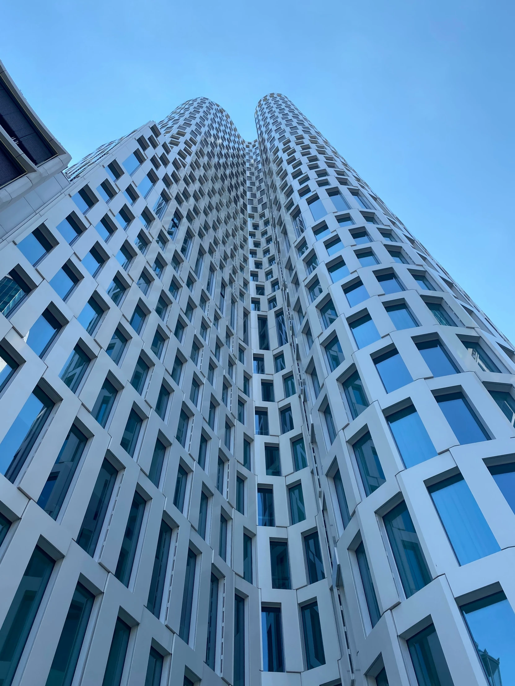 looking up at the side of an office building