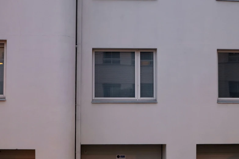 two garages with no windows next to each other