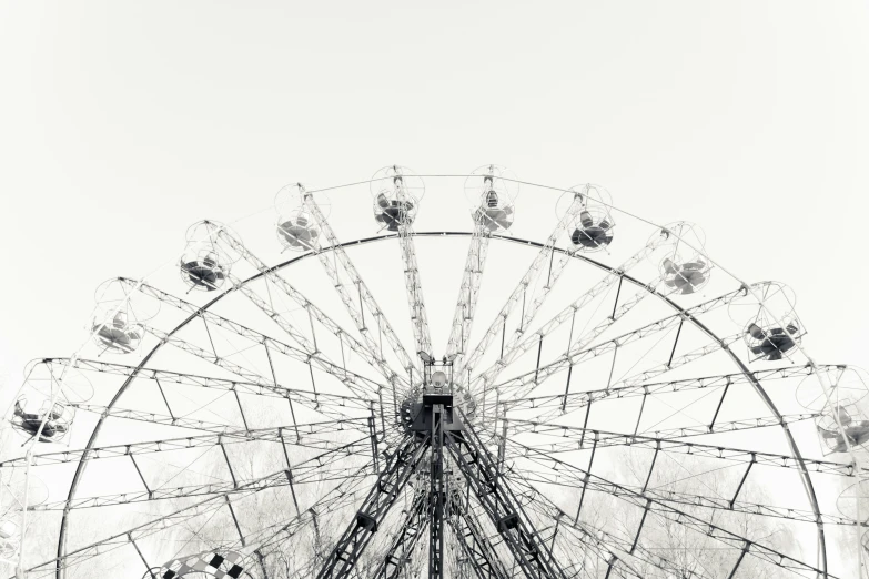 an image of a ferris wheel with two men inside