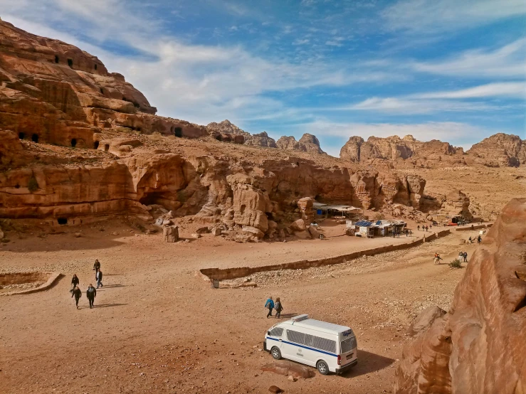 an image of a desert setting with a bus