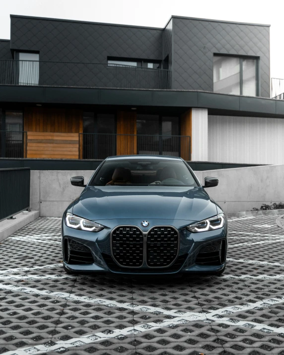 a grey car parked in an empty parking lot