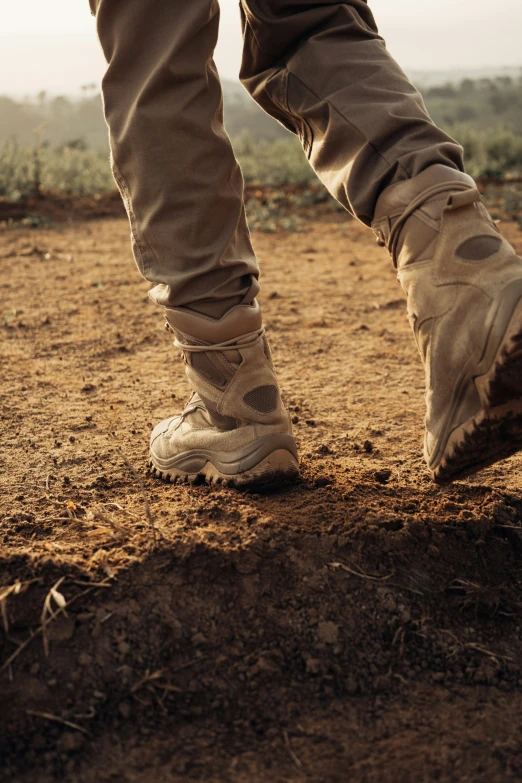 a person with their feet up on the ground