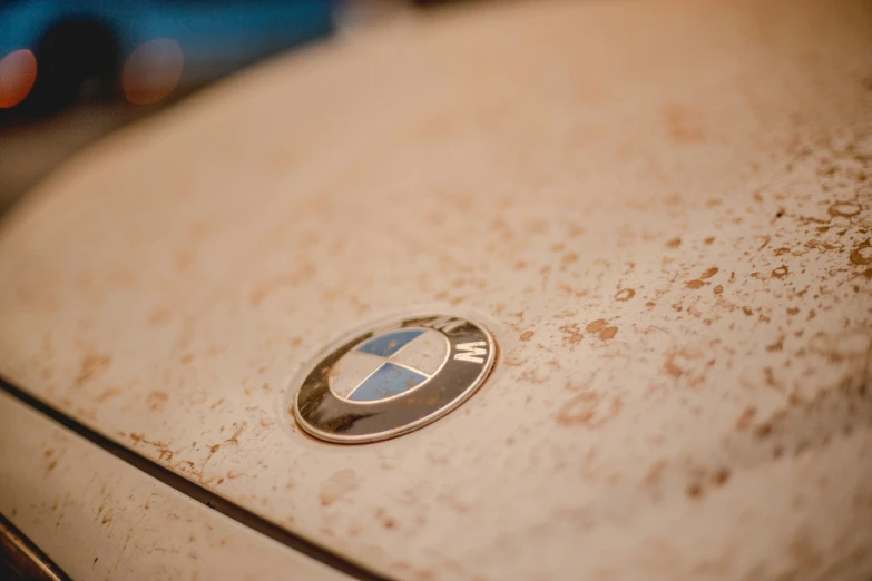 a close up view of a bmw emblem on the hood