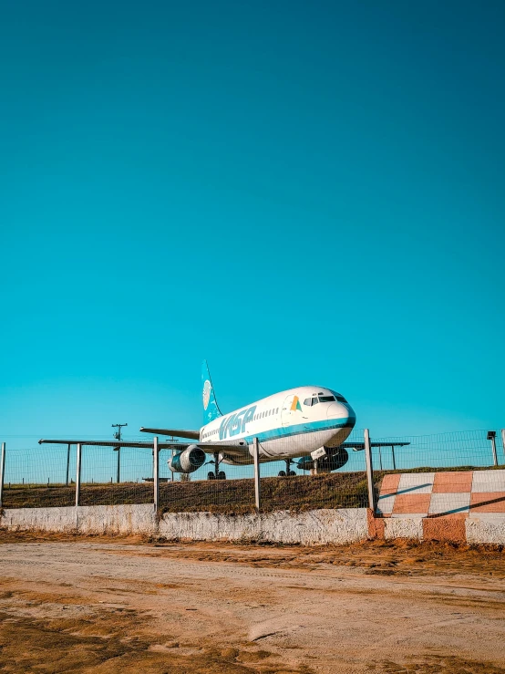 a large airplane sitting on top of a runway
