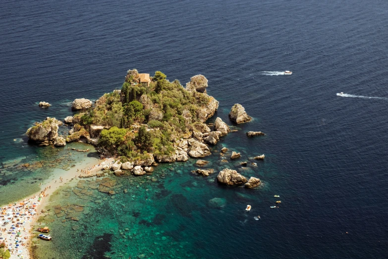 an island with many people in the water