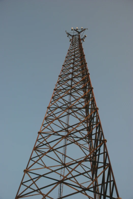 a tall structure on the side of a large building