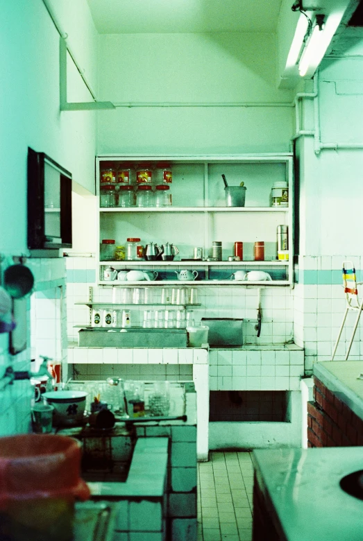 a kitchen filled with all kinds of things that are on a shelf