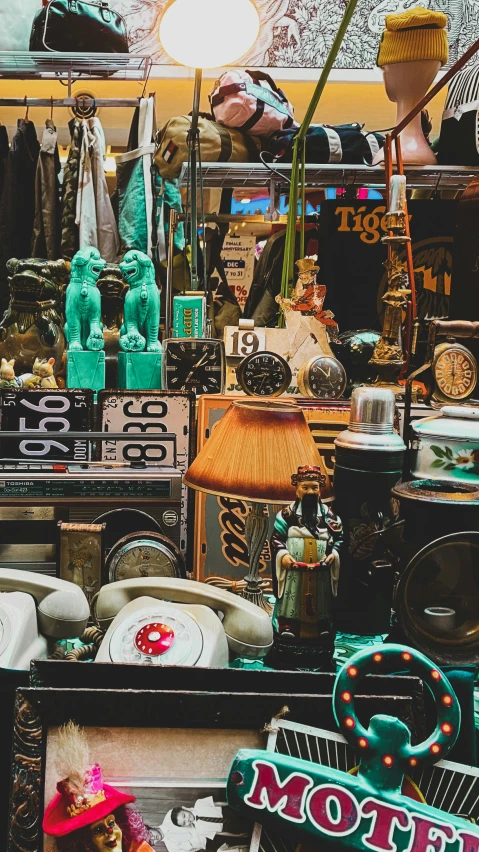 a market with many items such as hats and lamp shades