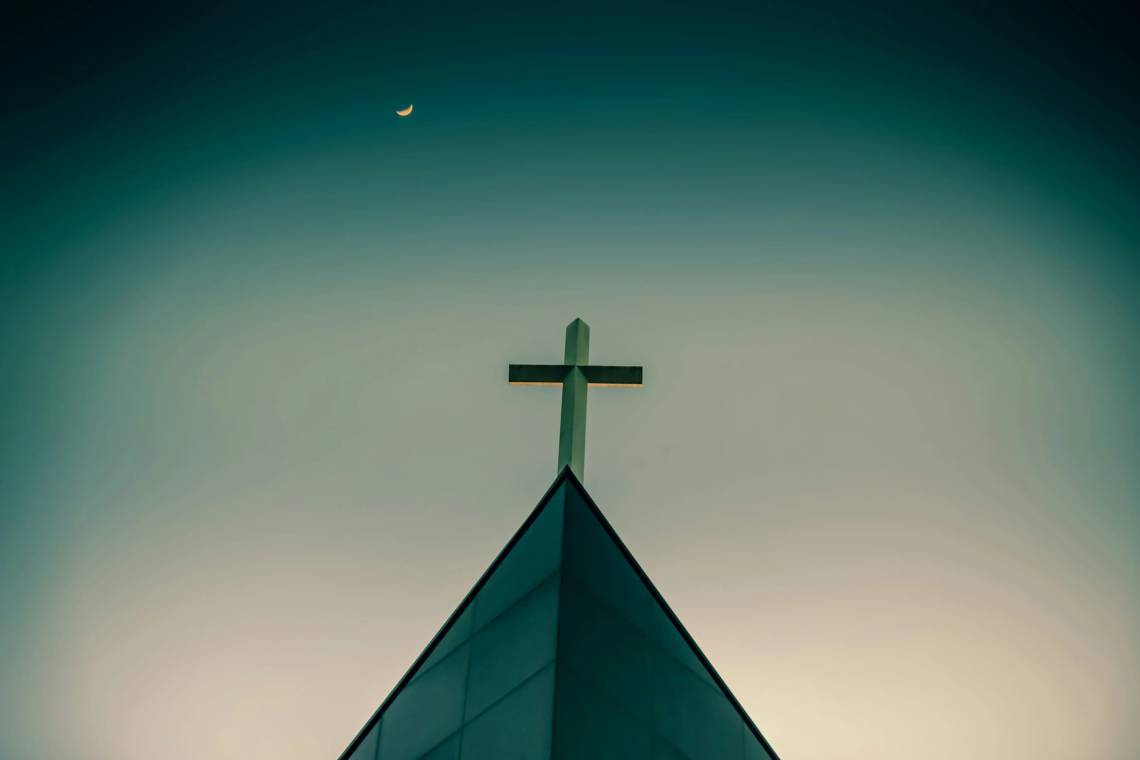 there is a cross on the top of a church