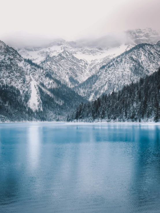 a large body of water surrounded by mountains