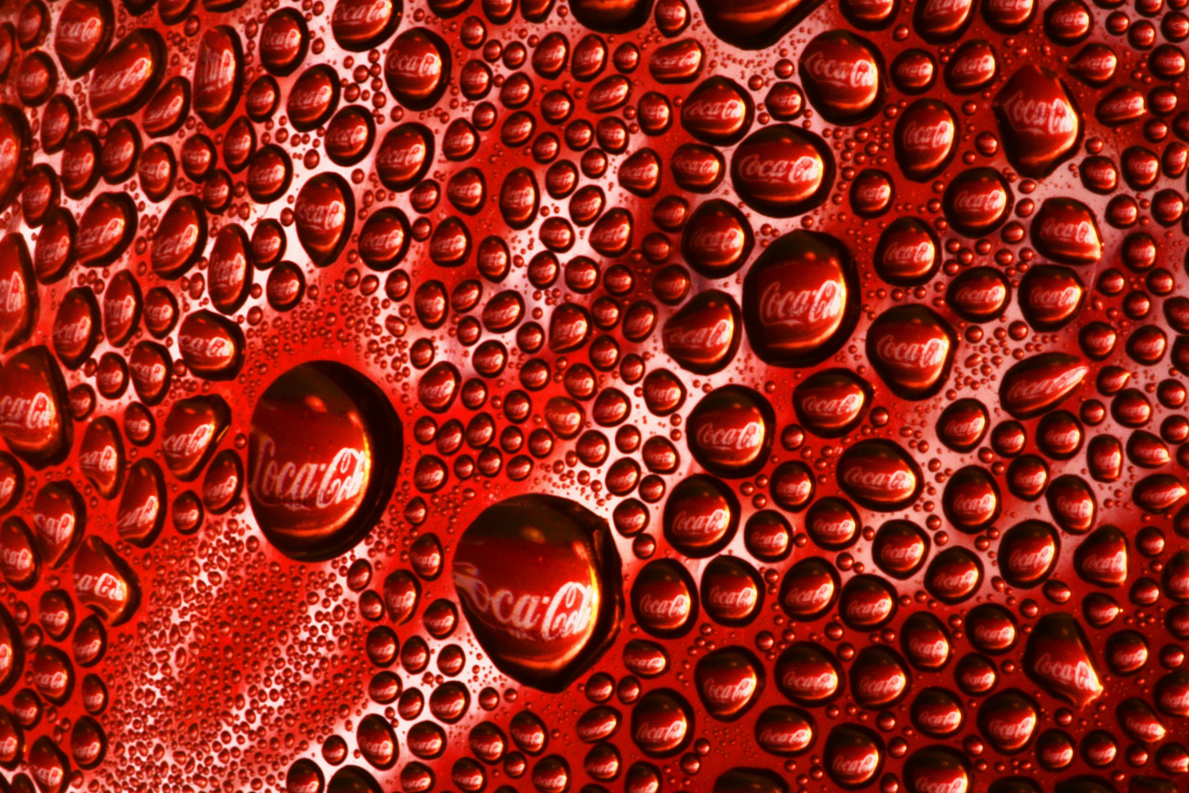 a group of soda bottles sitting next to each other