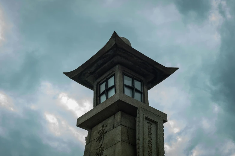 the clock is attached to the tower of the building