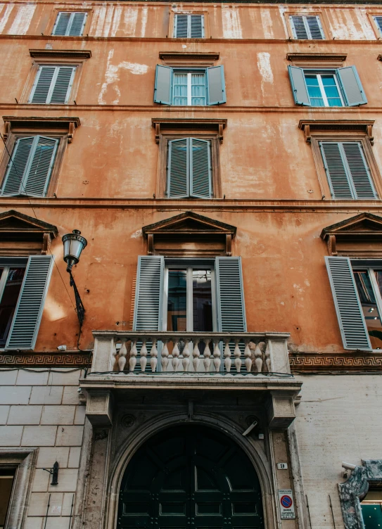 large building with many windows and stone architecture