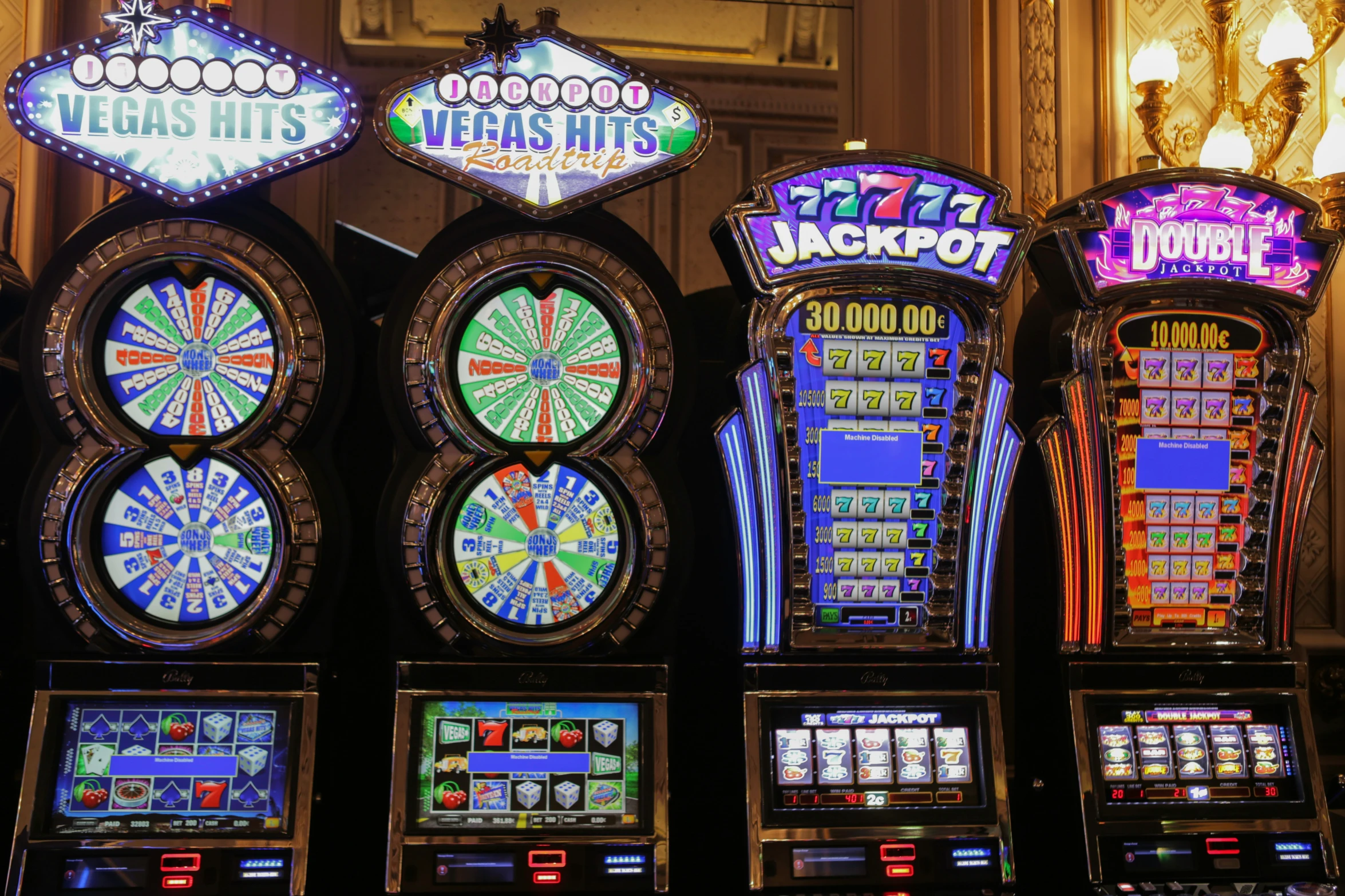 a line of gambling machines with slots in them